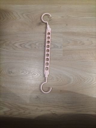 Percha ahorra espacio