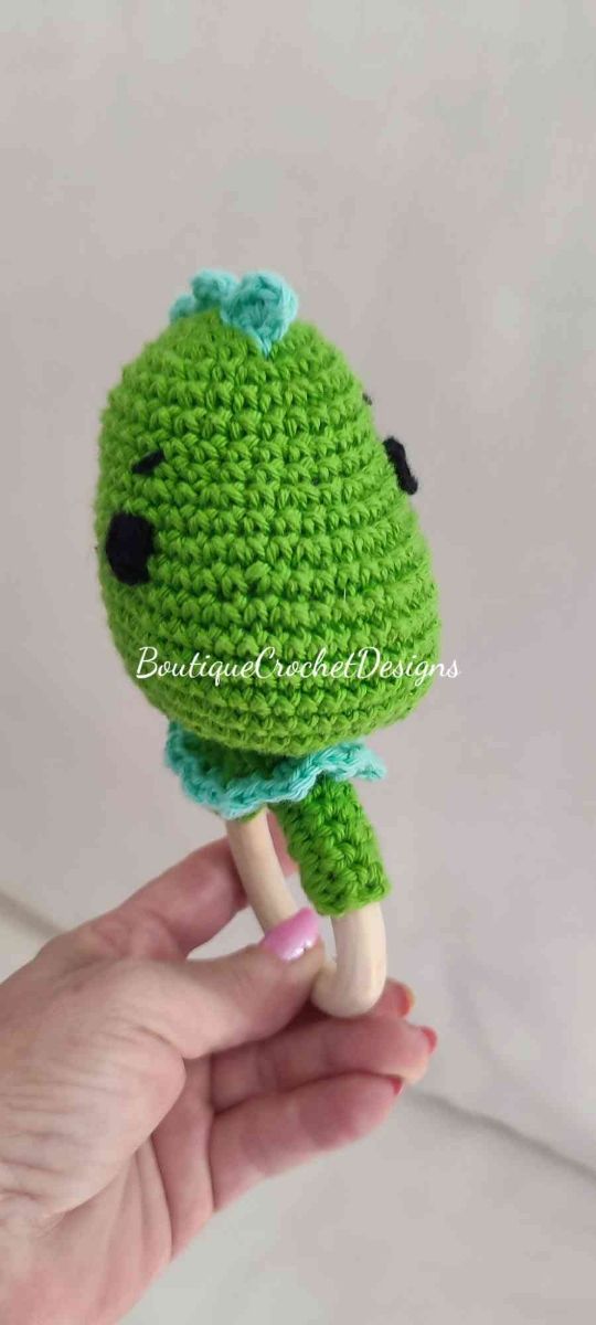 Chupetero y sonajero Dino