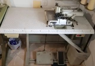 Maquina de coser de 5 hilos brother