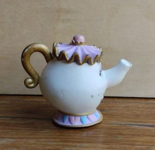 Statuetta in PVC con teiera della signora Potts