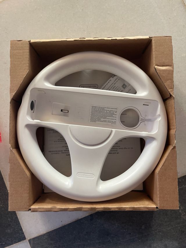 Mando volante y juego mariokart wii