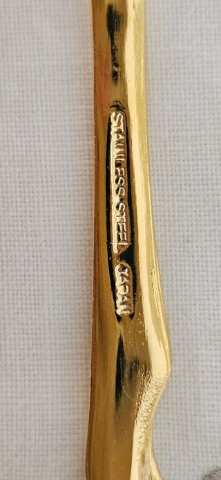 Set di 15 posate in acciaio dorato