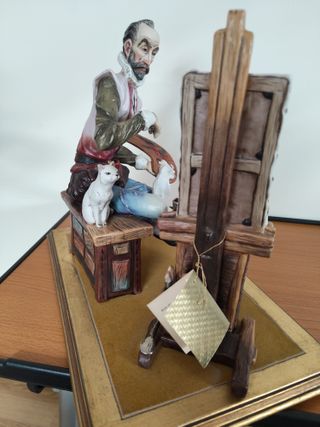 Figura del Quijote pintando a Cervantes