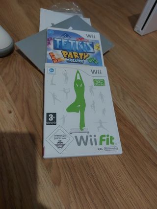 Consola wii con tabla fit, mand y juegos
