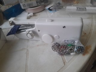 Máquina coser manual