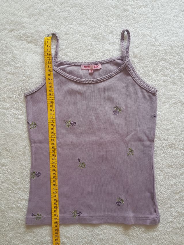 3 camisetas de tirantes de Nice Day.