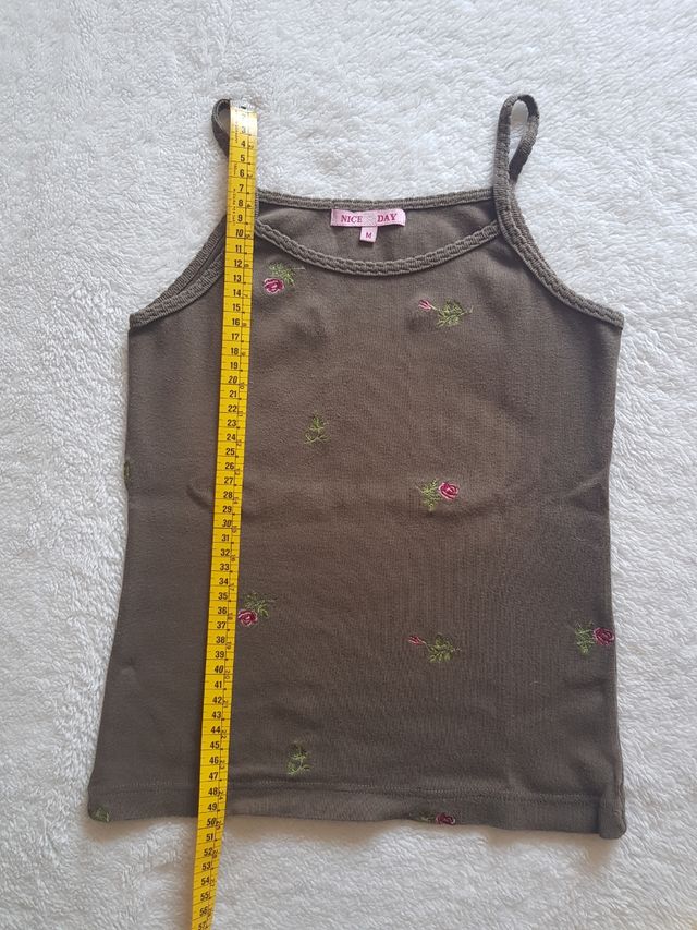 3 camisetas de tirantes de Nice Day.