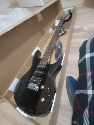 Guitarra electrica washburn rx10 mb y ampli