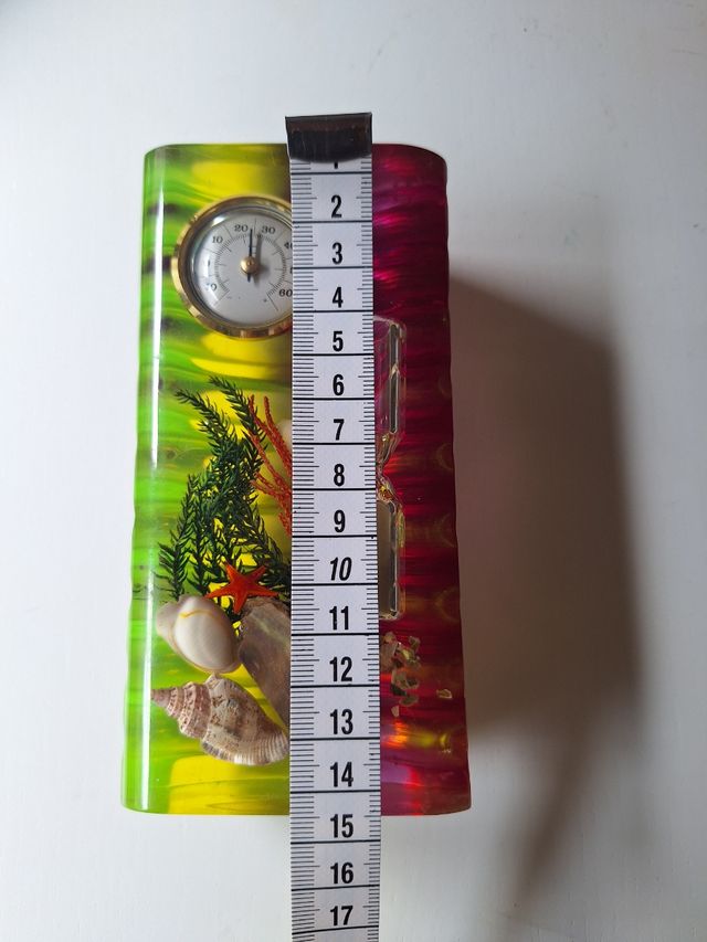 Figura termometro y reloj de arena