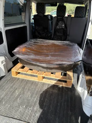 Mudanzas , portes y transportes