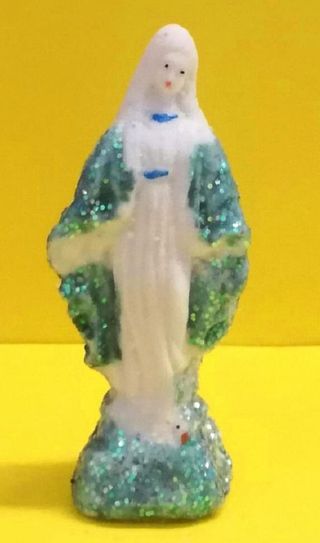Statuetta madonna di Lourdes cambia colore meteo