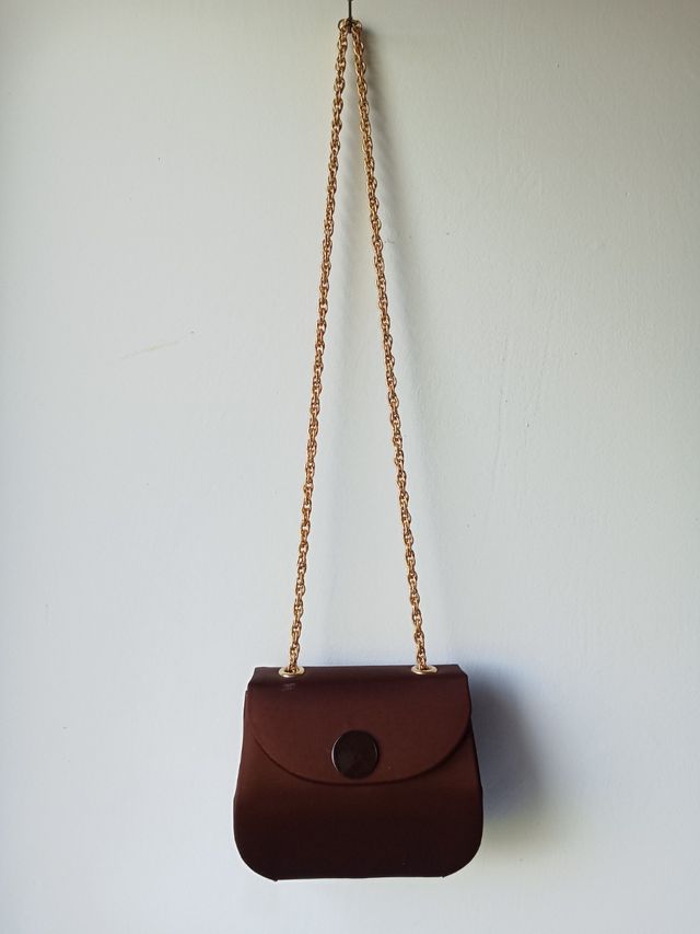 Borsetta elegante colore prugna.