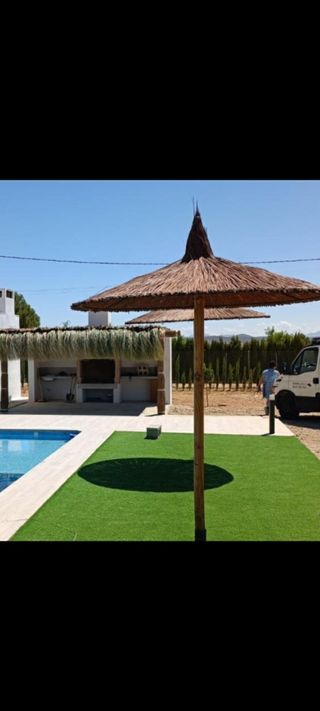 Sombrillas de carri verzo mimbre