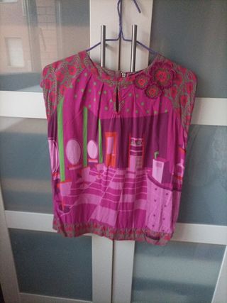 Blusa con cremallera trasera