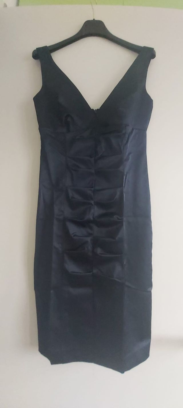 Abito blu nuovo con cartellino