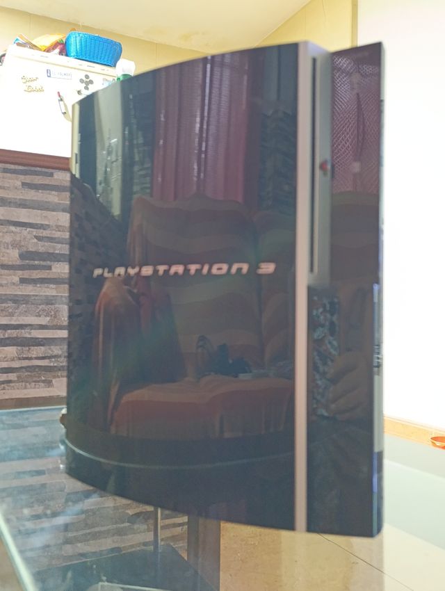 PlayStation 3 + Mando + 5 Juegos