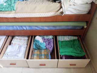 Cama doble nido con cuatro cajones