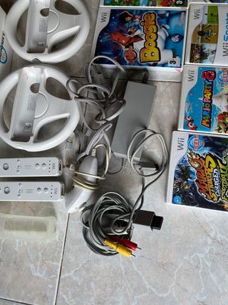 wii con 2 mandos, juegos y volantes para mariokart