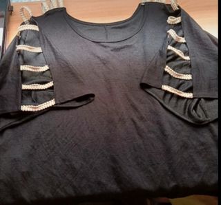 Blusa mujer negra con hombros de