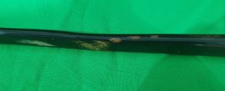 Antiguo calzador simil carey o asta con egipcio