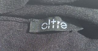 Coprispalle nero con catene di oltre 