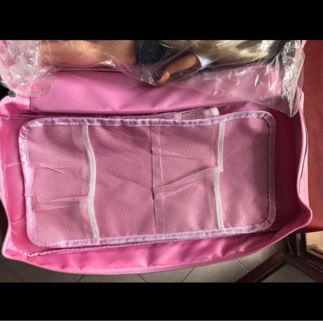 Mochila , maletin porta muñecas a estrenar