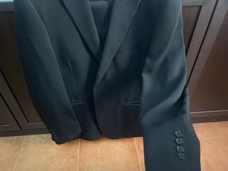 Traje