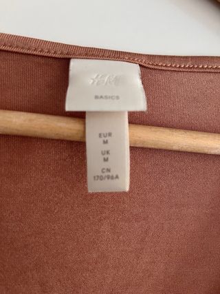 Camisa h&m dorada metalizada talla M 38