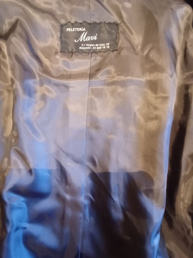 Chaqueta de pelo gris,peletería