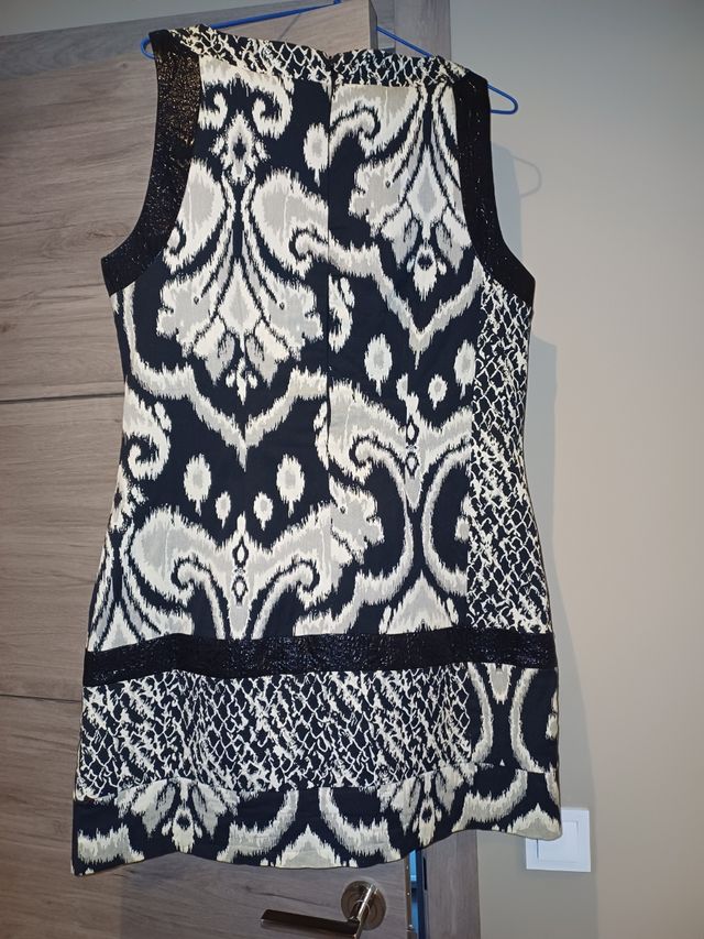 Vestido desigual, 46