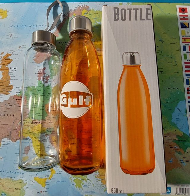 2 Botellas de vidrio.