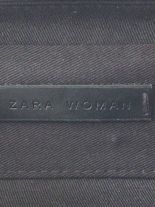 Clutch tachuelas ZARA