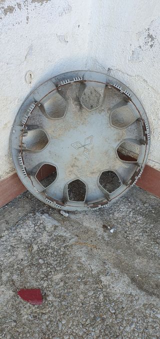  1 Tapacubos 15 mitsubishi (sólo uno)