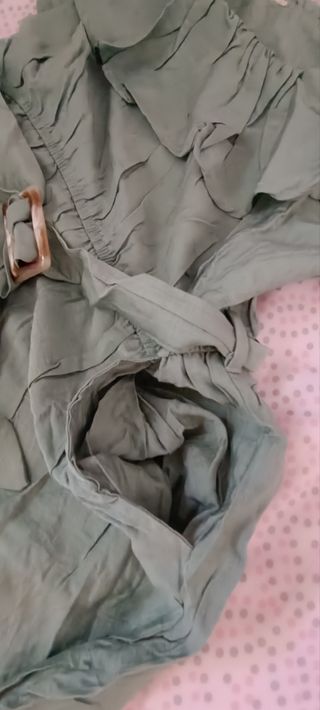 Mono palazzo con cinturón