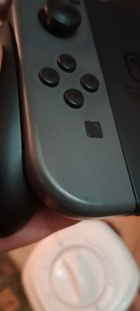 Coppia joy-con originali + impugnatura
