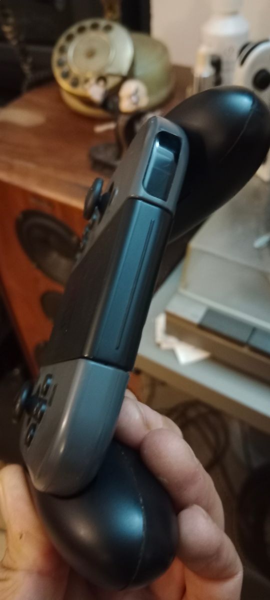 Coppia joy-con originali + impugnatura