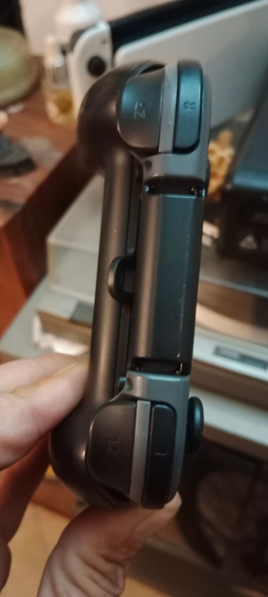 Coppia joy-con originali + impugnatura