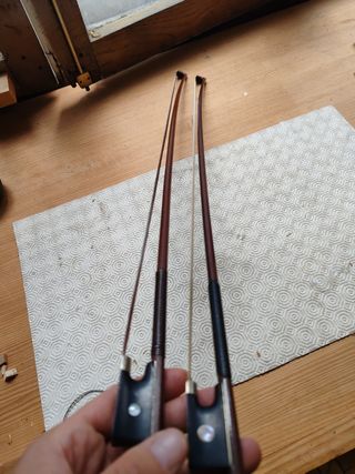 Encerdado arco violín