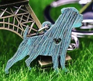 Busca tu broche, colgante o llavero de perros
