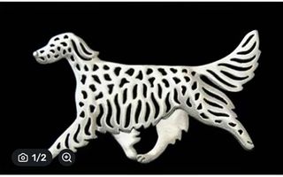 Busca tu broche, colgante o llavero de perros