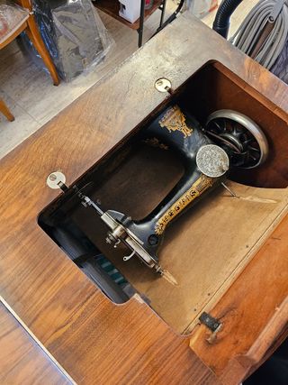 Máquina de coser con máquina Singer