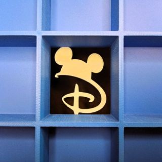 ✅ Expositor figuras Disney 100 años