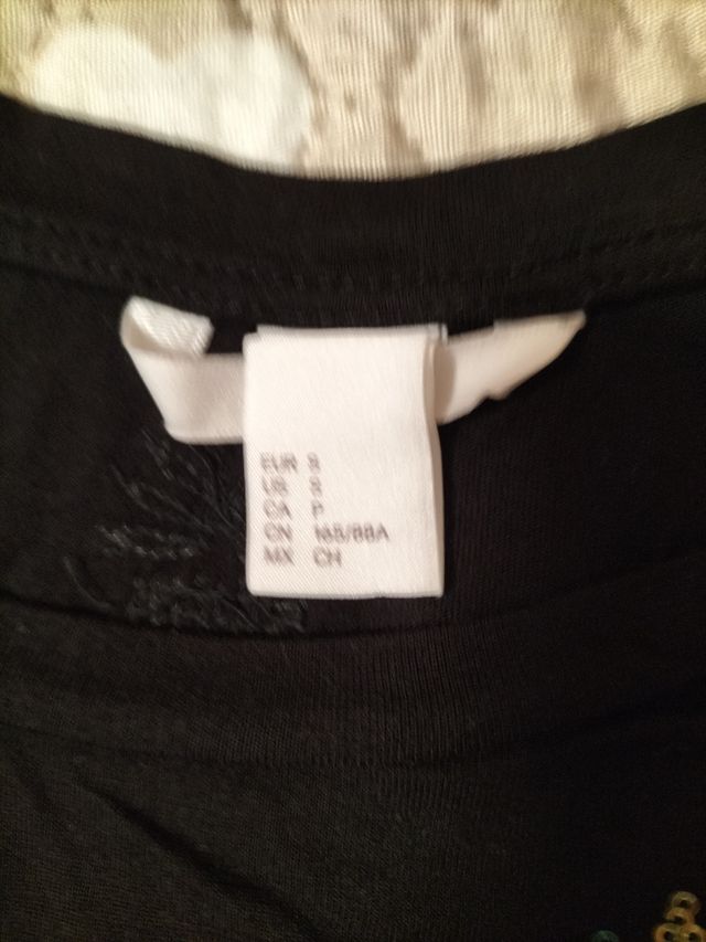 T-shirt con paillettes H&M