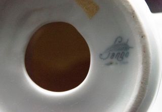 Figura de porcelana Sanbo