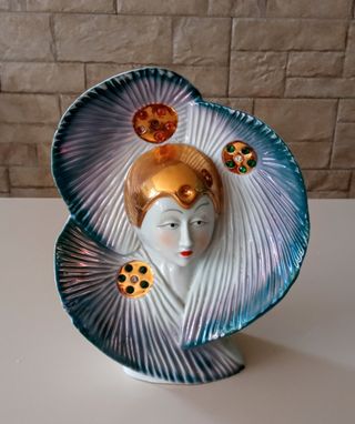 Figura decorativa em porcelana