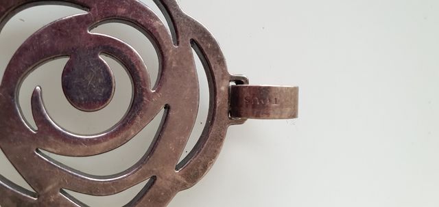 Colgante tous flor plata