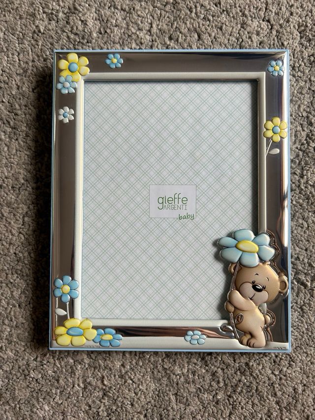 Cornice in argento con confezione