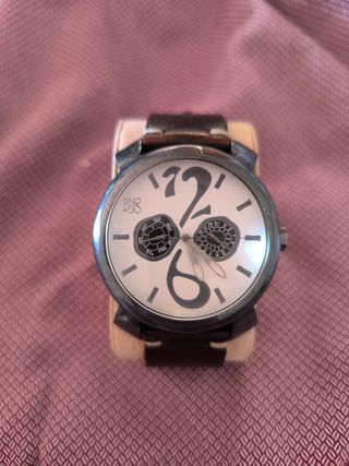 Reloj de UNOde50