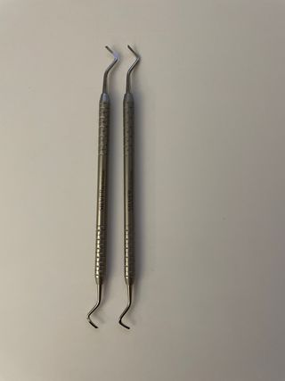 Recortadores de márgenes distal y mesial