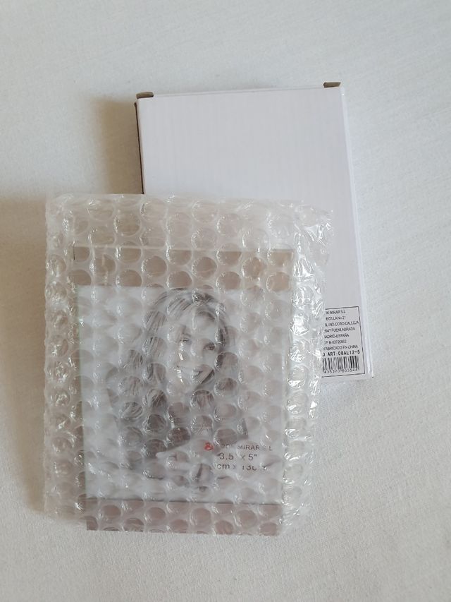 Portaretrato alumno y cristal  7 €